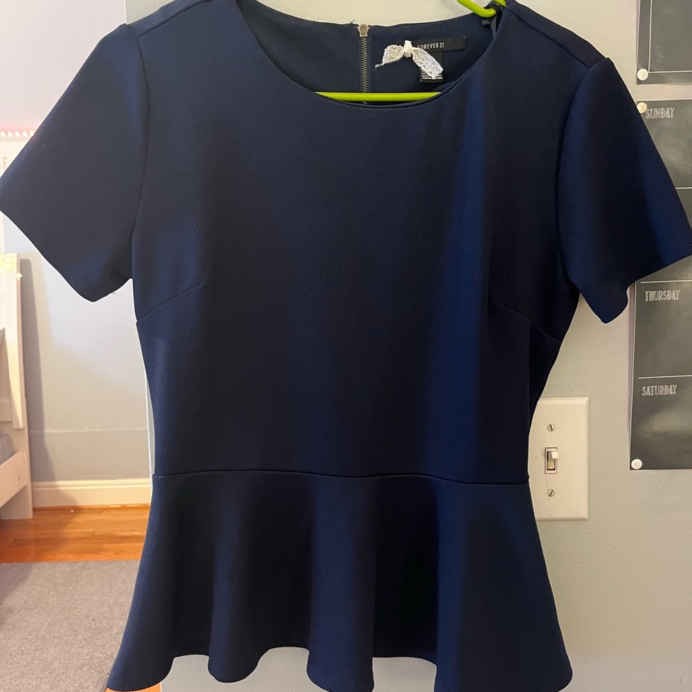 Navy Blue woman’s shirt. Forever 21. barely worn. like new. great material.